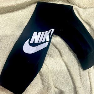 Womans black Nike leggings.